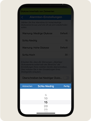 Ein Smartphone zeigt die Toneinstellungen f&uuml;r Glukose Alarme an. Die Optionen umfassen &bdquo;Schlummern Niedrig&ldquo;.