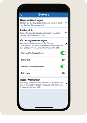 Ein Smartphone zeigt die Einstellungen f&uuml;r die Glukose&uuml;berwachung mit Optionen f&uuml;r Warnungen an.